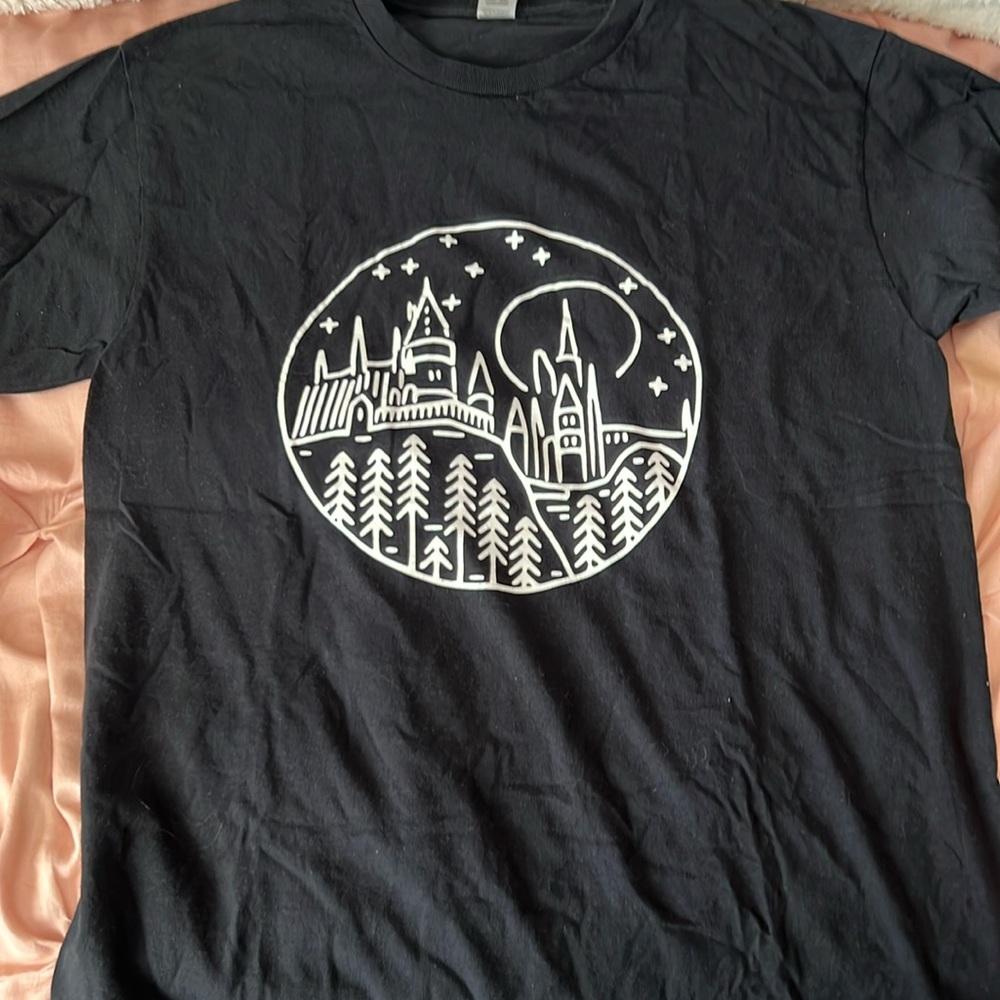 Black tee shirt with harry potter castle design, worn once